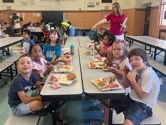 Kindergarten class sitting in the cafeteria